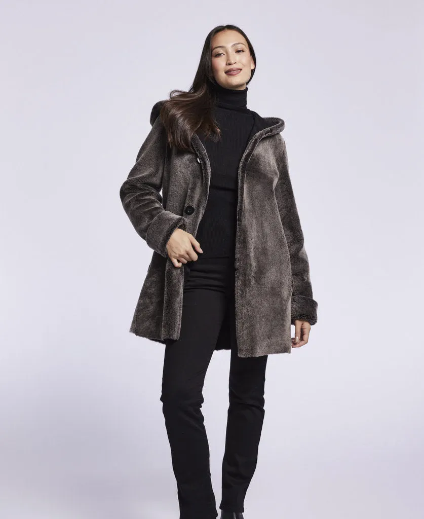 007 Reversible  hooded shearling topper just 3 left   1/S 1/\M 1/l   SOLID BLACK $500  sorry no additional discounts