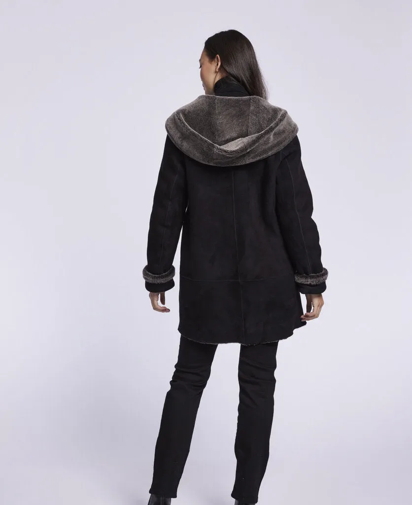 007 Reversible  hooded shearling topper just 3 left   1/S 1/\M 1/l   SOLID BLACK $500  sorry no additional discounts