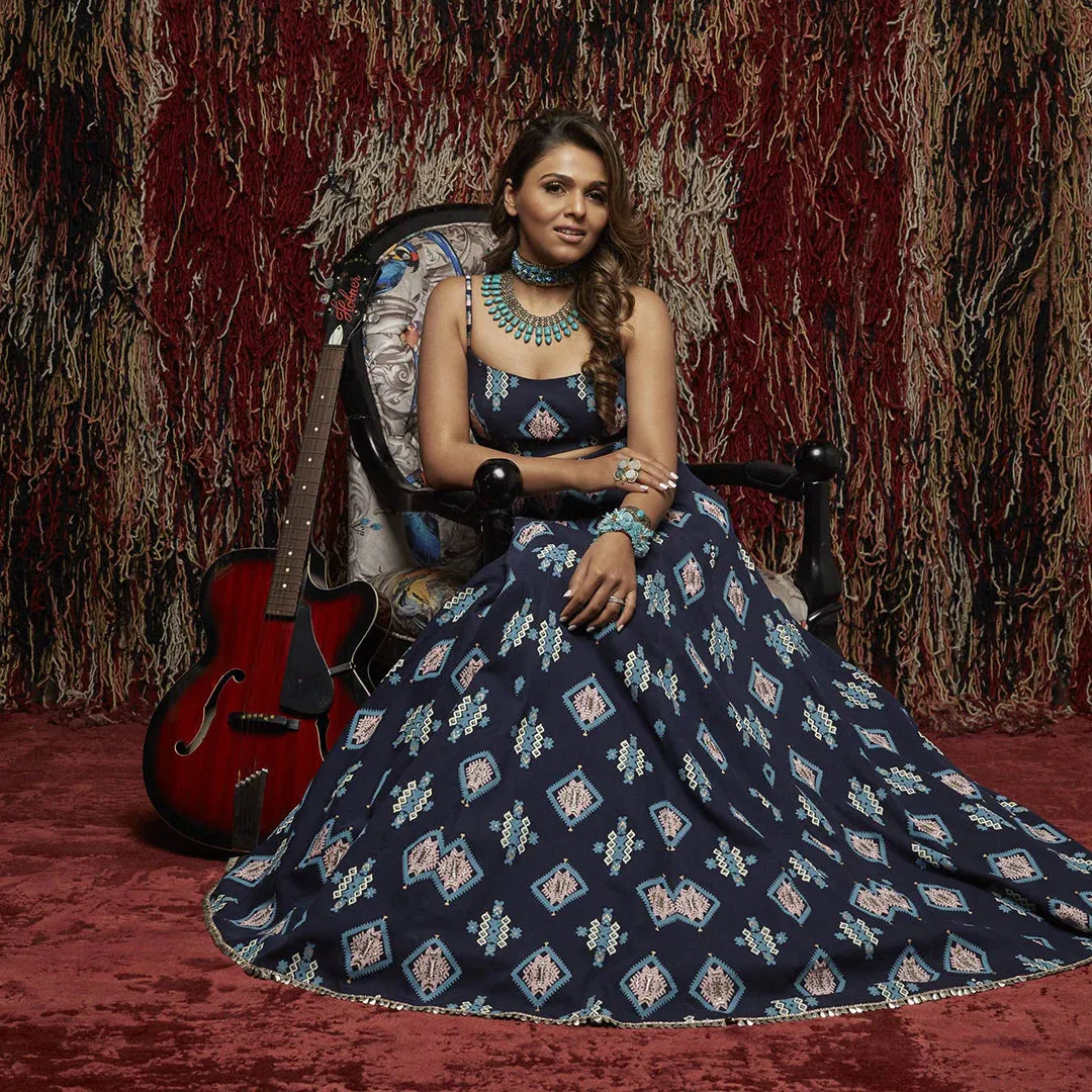 DARK BLUE PRINTED DENIM BUSTIER PAIRED WITH PRINTED LEHENGA