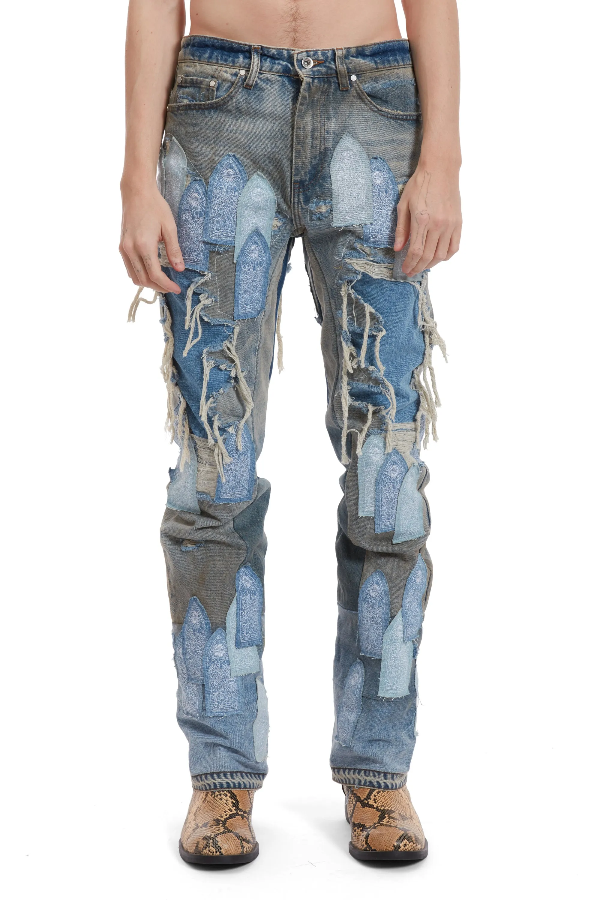 PATCHED ARCH REPAIRED BLOWOUT DENIM